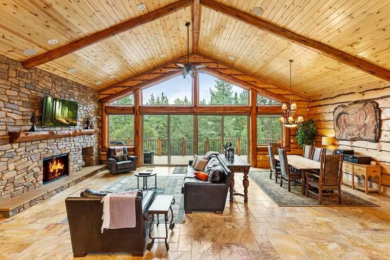 Cozy wooden cabin interior with forest view at Big Bear.