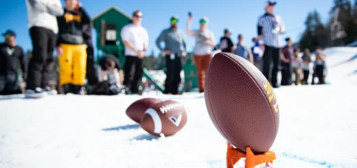 Participant runs a snow football course during the Bear Bowl event at Big Bear Mountain Resort