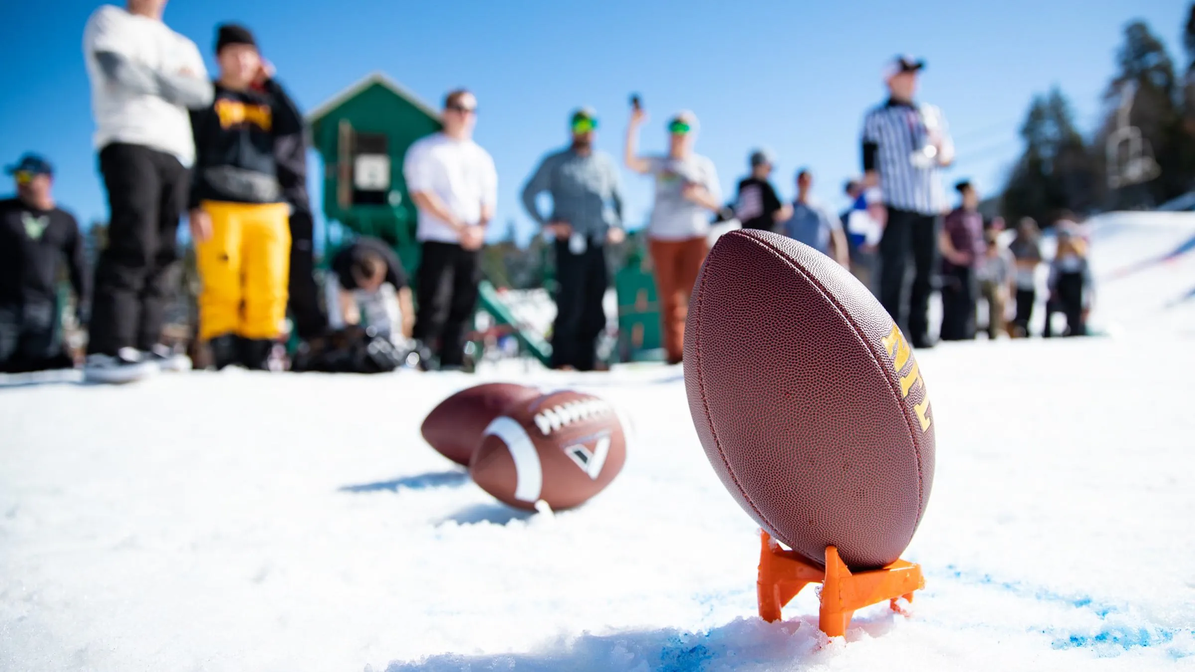 Participant runs a snow football course during the Bear Bowl event at Big Bear Mountain Resort