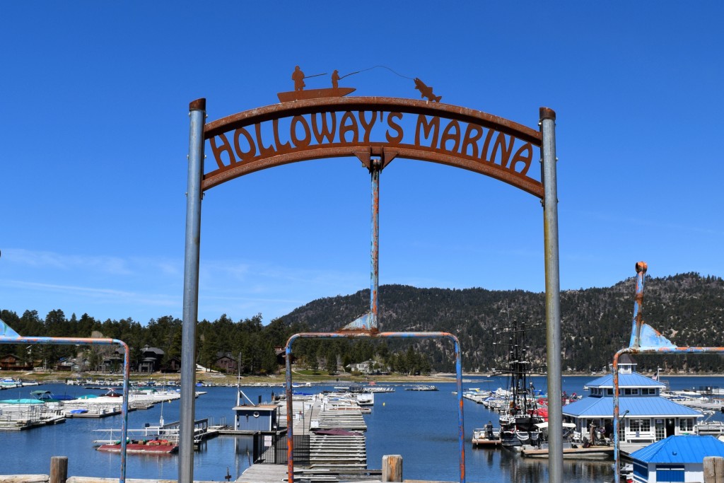 Enjoy the Pirate Ship Ride at Holloway's Marina, Big Bear Lake, surrounded by beautiful, forested mountain scenery.