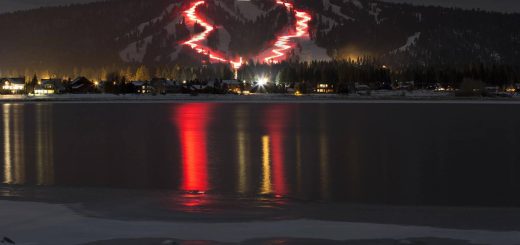 Skiers prepare for Big Bear’s New Year’s Eve Torchlight Parade at night