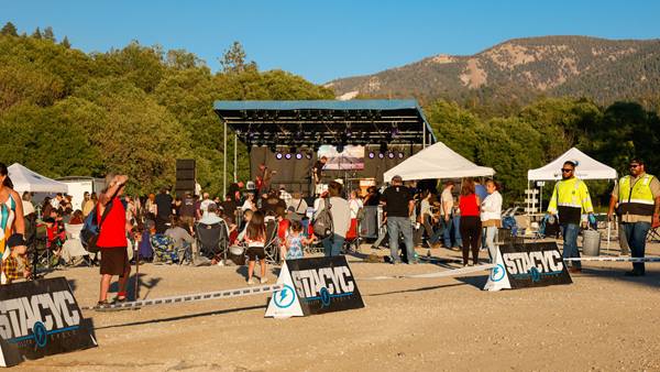 Concertgoers enjoying a live outdoor performance during the Moonridge Concert Series in Big Bear.