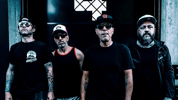 Members of Alien Ant Farm posing before their performance at the Moonridge Concert Series.