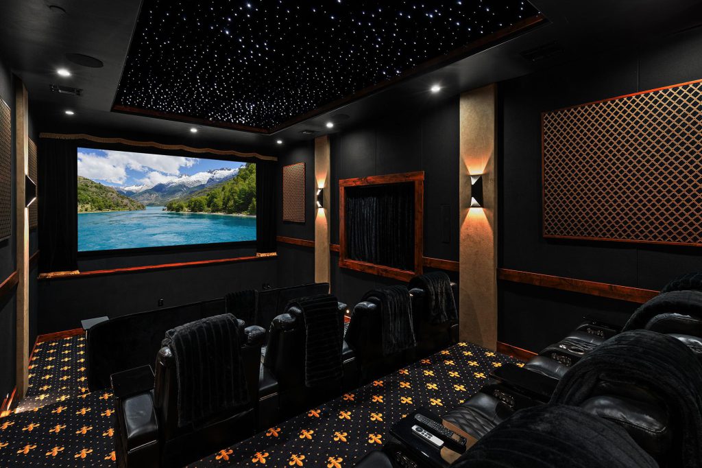 White Pine Lodge private home theater with luxury recliners and starry ceiling