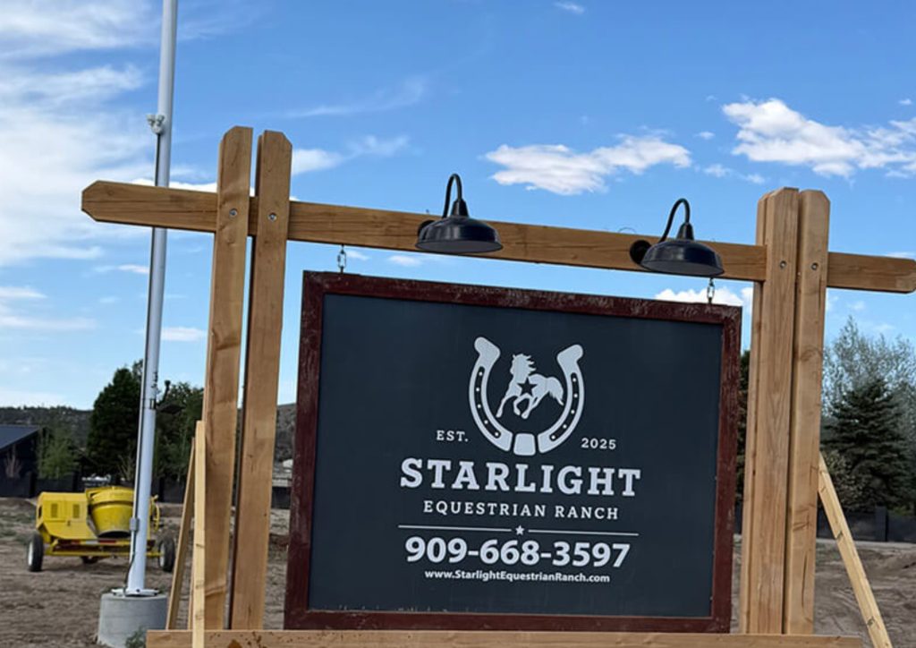 Entrance sign for Starlight Equestrian Ranch in Big Bear City, California.