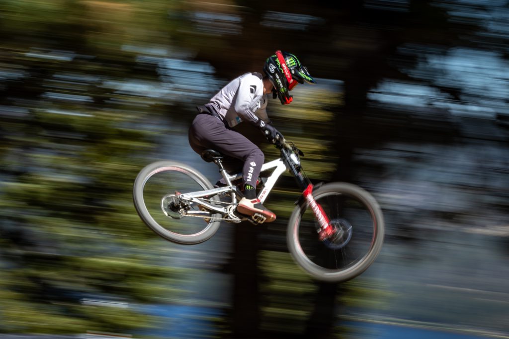 A mountain biker jumps mid-air during an event at Big Bear.