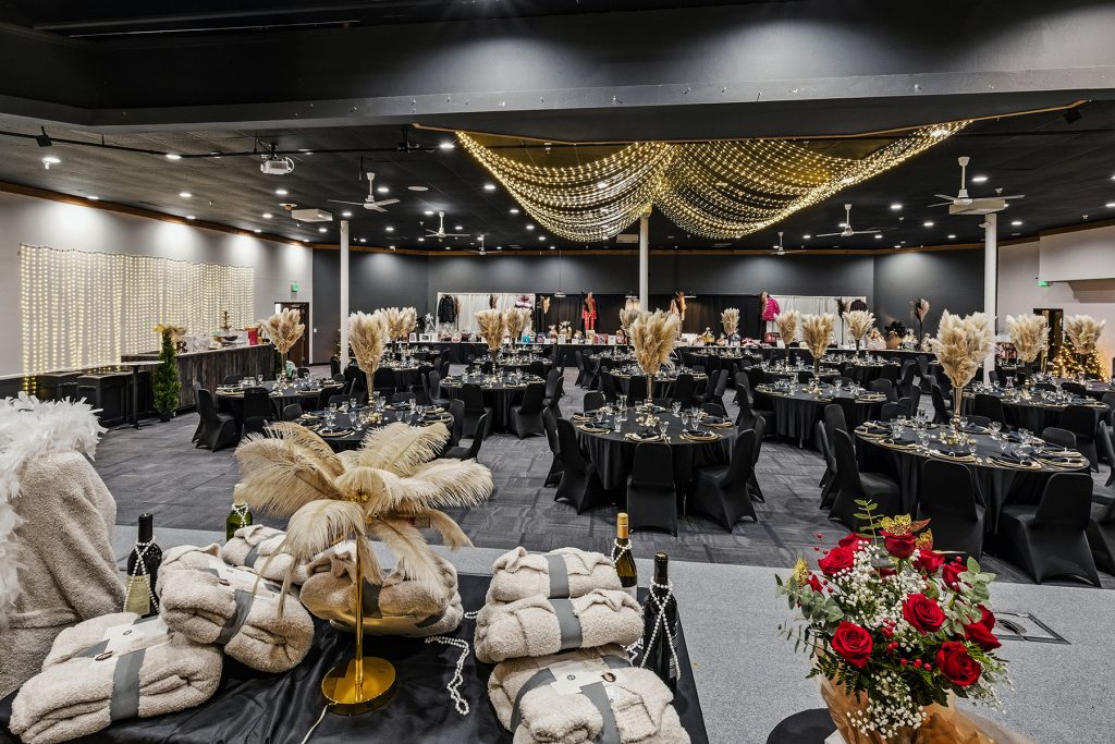 Banquet room view with dining tables and elegant event styling