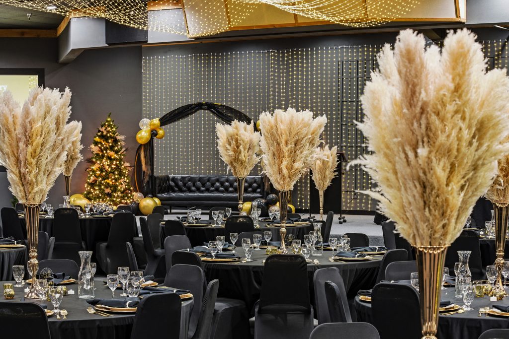 Banquet hall interior showcasing elegant seating and decorative lighting