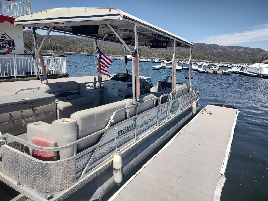 Pontoon fishing boat used by Cantrell Guide Service at Big Bear Lake marina