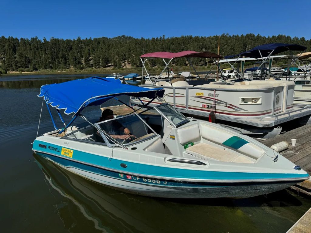 Captain John’s Marina on Big Bear Lake with kayak rentals, docks, and scenic mountain views in Fawnskin