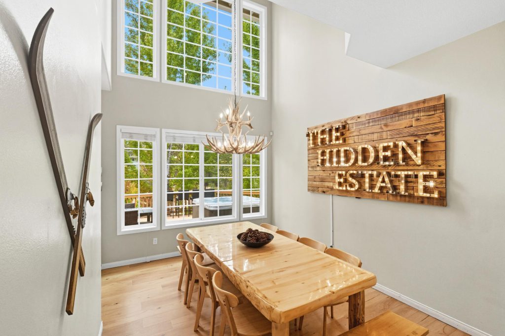 The Hidden Estate in Big Bear California dining room with tall grid pane windows
