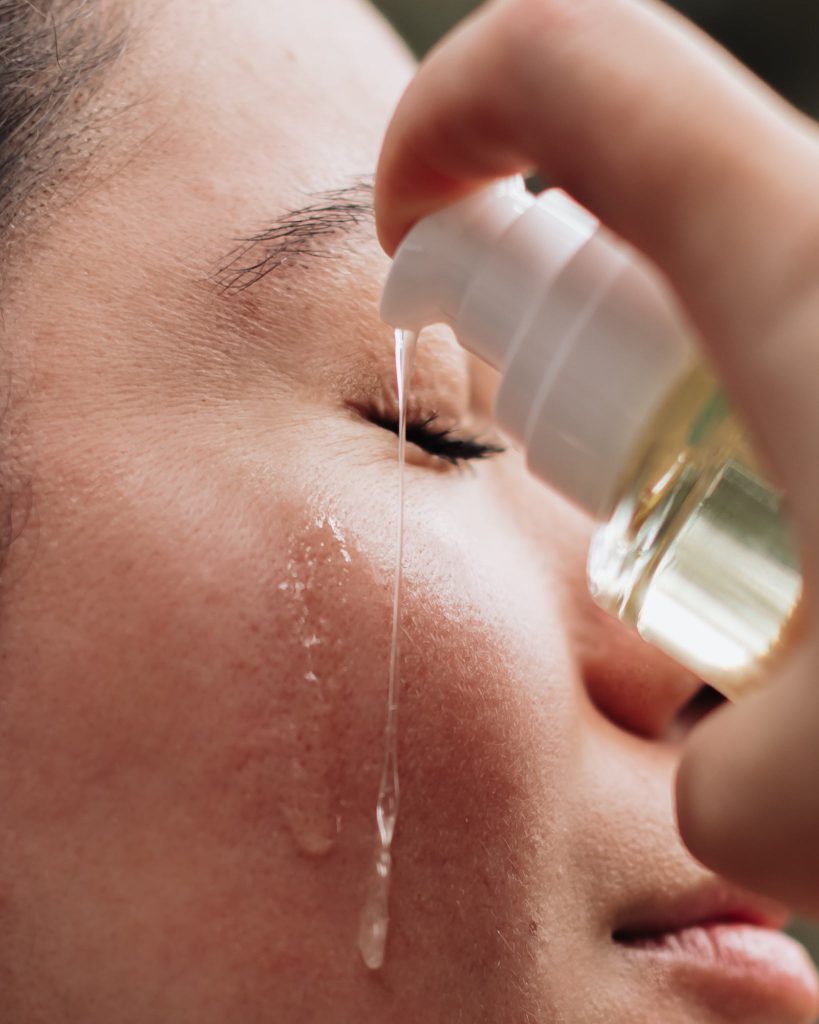 Close-up of skincare serum being applied during facial treatment