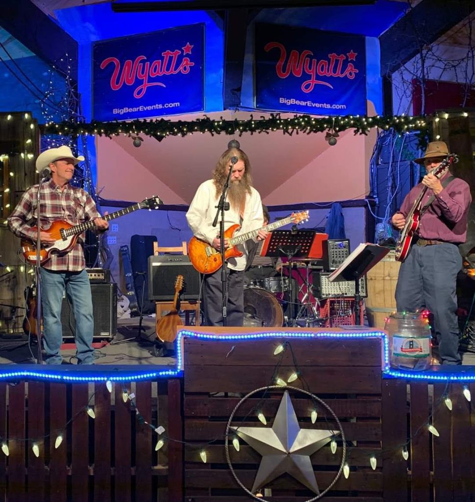 Oktoberfest celebration inside Wyatt’s Grill & Saloon in Big Bear Lake with live band, Bavarian flags, and festive decor.