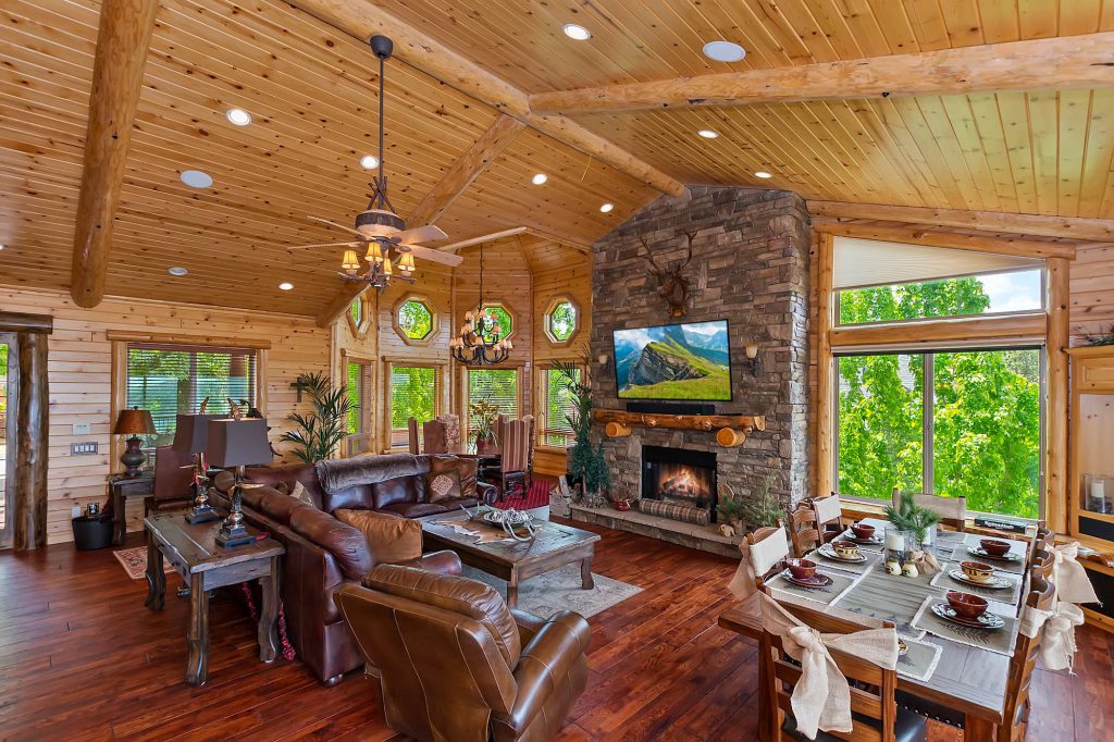 Cozy cabin living room with fireplace at Destination Big Bear