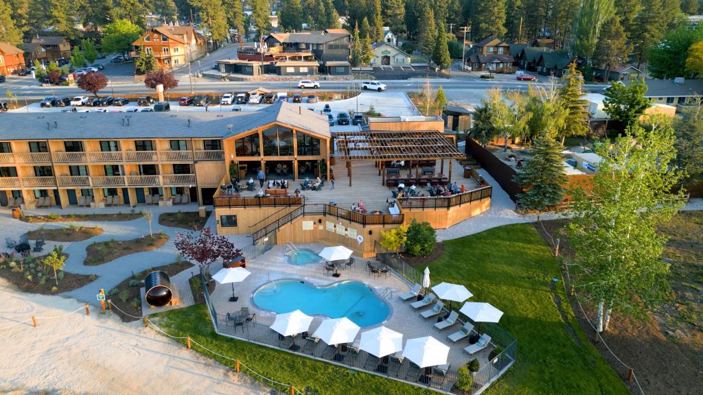 Close-up aerial of Marina Riviera pool and outdoor dining patio