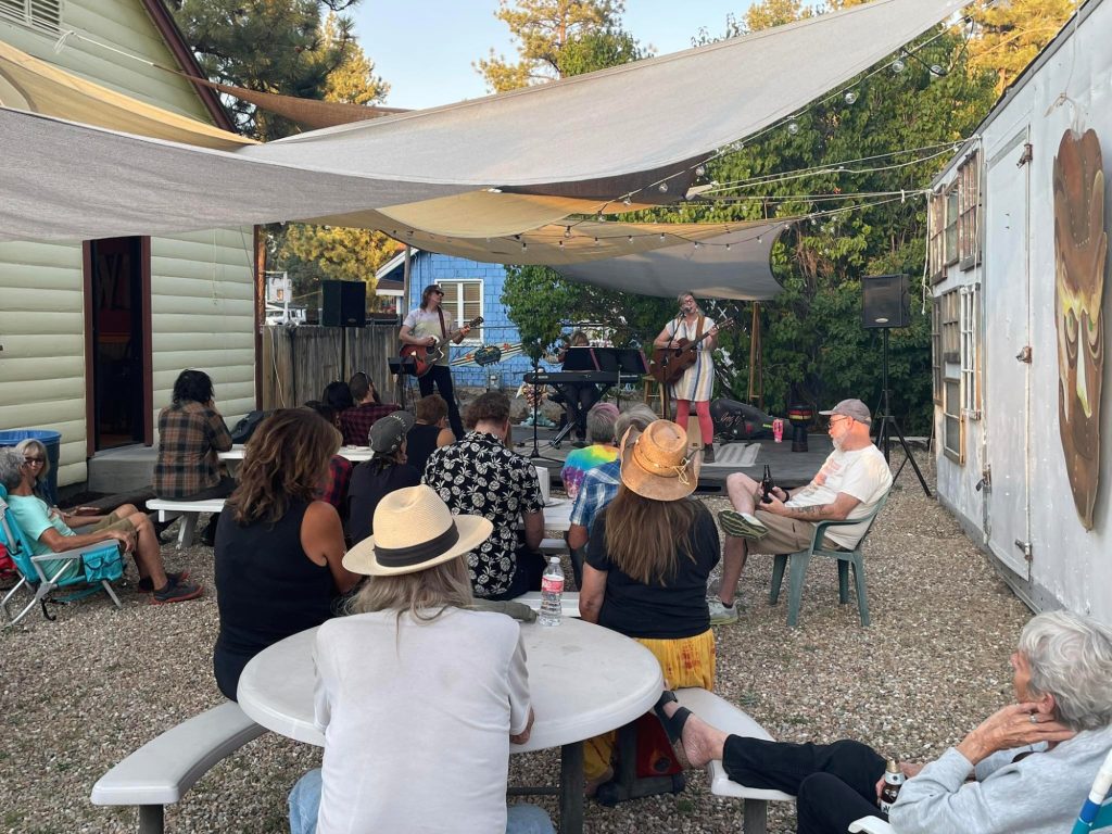 Guests participating in an indoor trivia night event at No Name Pizza in Big Bear Lake