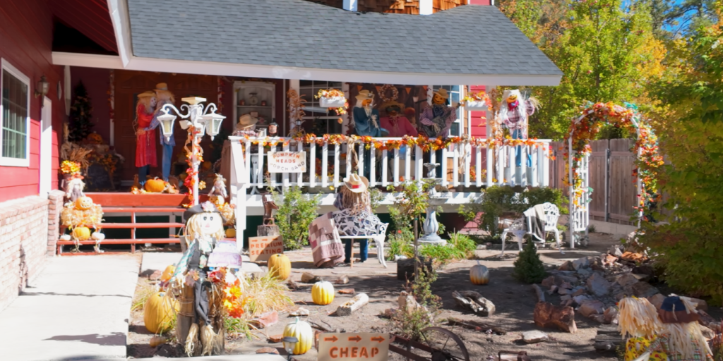 Halloween-themed decorations on a porch of a house participating in the Big Bear Scarecrow Contest.
