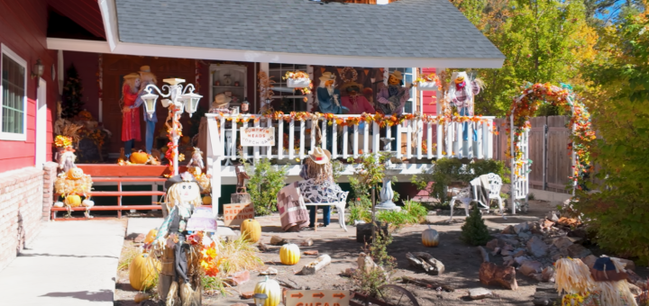 Halloween-themed decorations on a porch of a house participating in the Big Bear Scarecrow Contest.