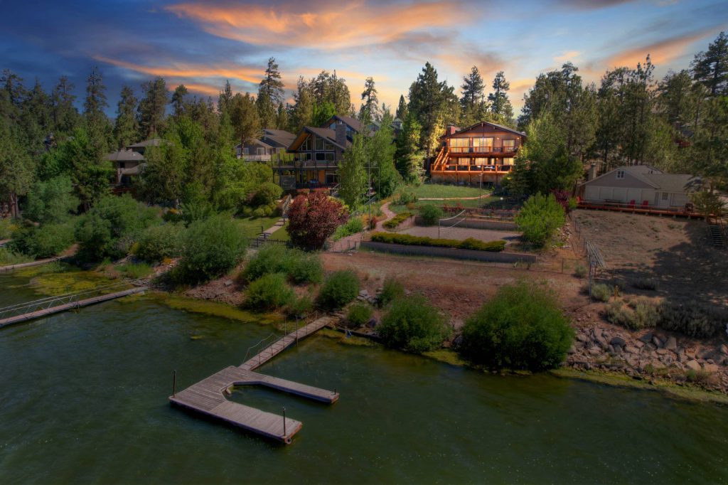 Lakefront homes and docks along Big Bear Lake at sunset