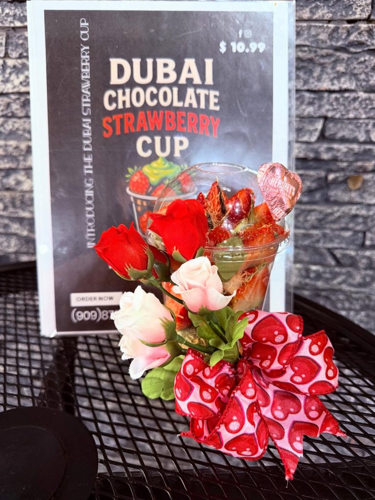 Dubai chocolate strawberry cup dessert from Frusion Juice & Coffee Bar featuring fresh strawberries and sweet toppings.