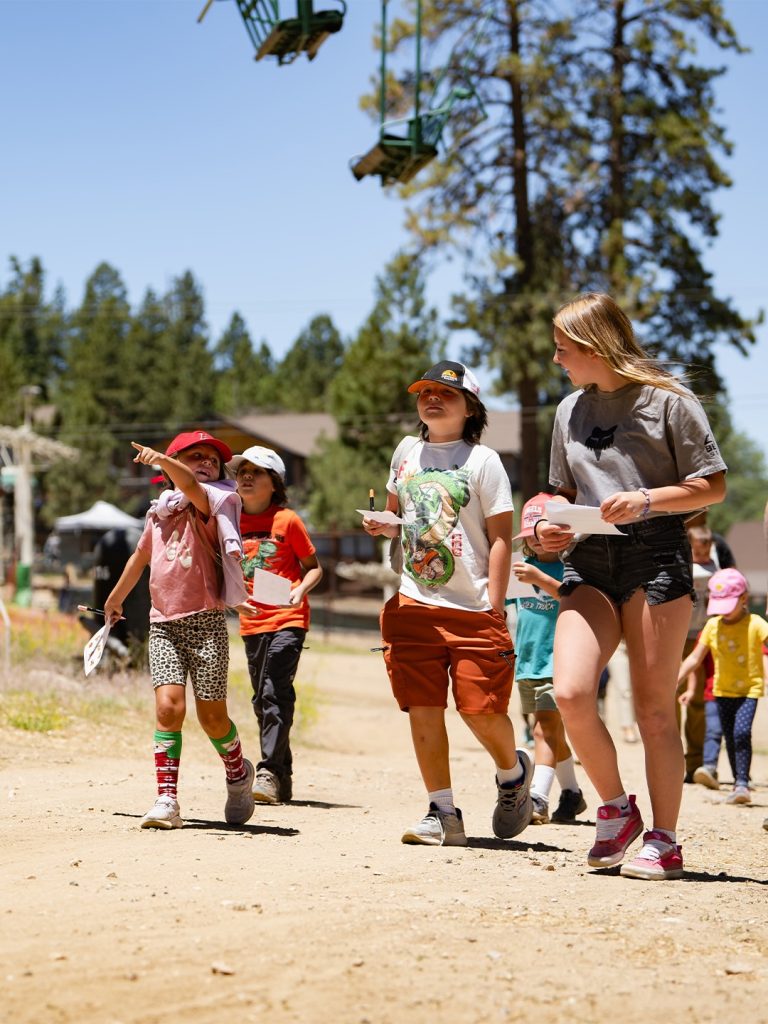 Children enjoying a family-friendly outdoor activity near the chairlift at Big Bear Lake.