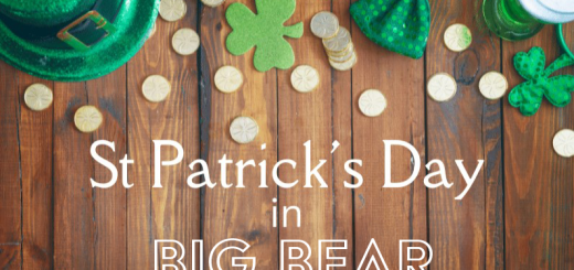 Words reading St Patrick's Day in Big Bear overlaying a wood table viewing from above with a green hat, shamrocks, and coins on the table.