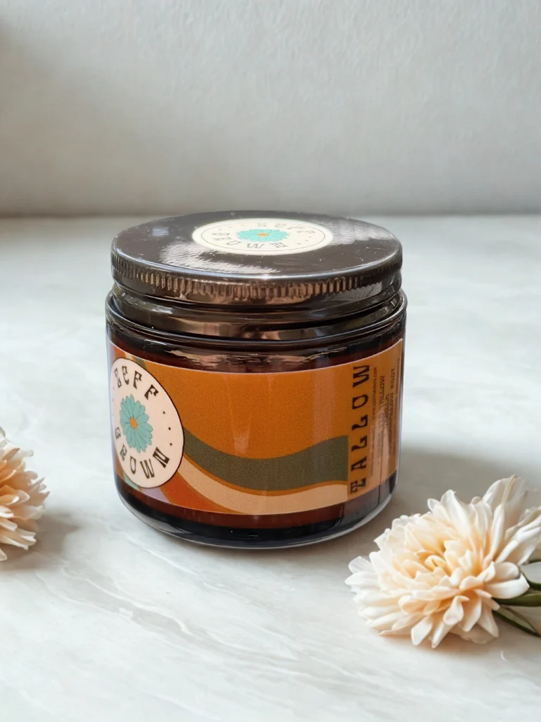 A jar of Zeff Wellness body butter surrounded by flowers on a table in Big Bear.