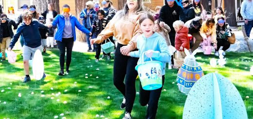 Families and children participating in Easter egg hunt at Big Bear Lake