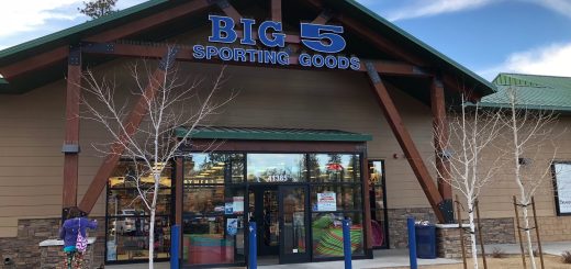 Exterior entrance of Big 5 Sporting Goods retail store with storefront signage and customer entrance.