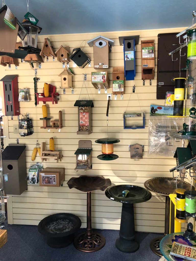 bird houses and backyard bird feeders displayed inside Chirp Nature Center in Big Bear Lake