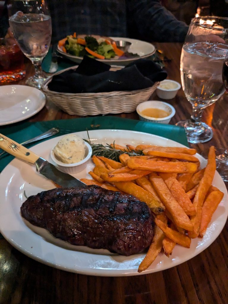grilled steak with sweet potato fries served at Captain’s Anchorage Big Bear Lake
