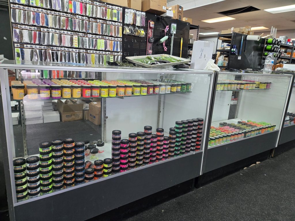 fishing bait containers and tackle supplies displayed inside Mountain Top Tackle Shop
