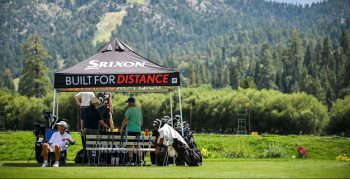 Close-up view of Srixon ZX series golf clubs and irons arranged for demo at Bear Mountain Golf Course.