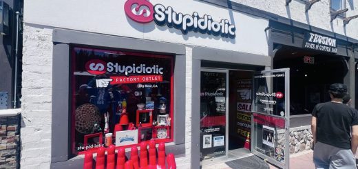 grass-themed flip flops display inside Stupidiotic Factory Outlet in Big Bear Lake