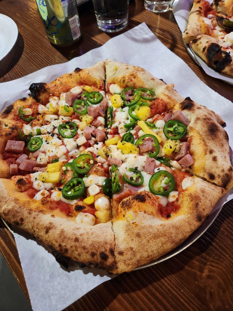 Hawaiian-style pizza with jalapenos and pineapple at Piza Kama Big Bear