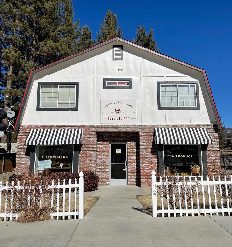 Front exterior view of The Legal Cupboard Market in Big Bear featuring local produce, provisions, and rustic storefront architecture