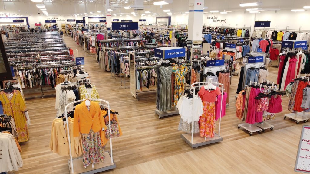 Spacious Marshalls apparel department with organized clothing racks, dresses, and fashion collections.