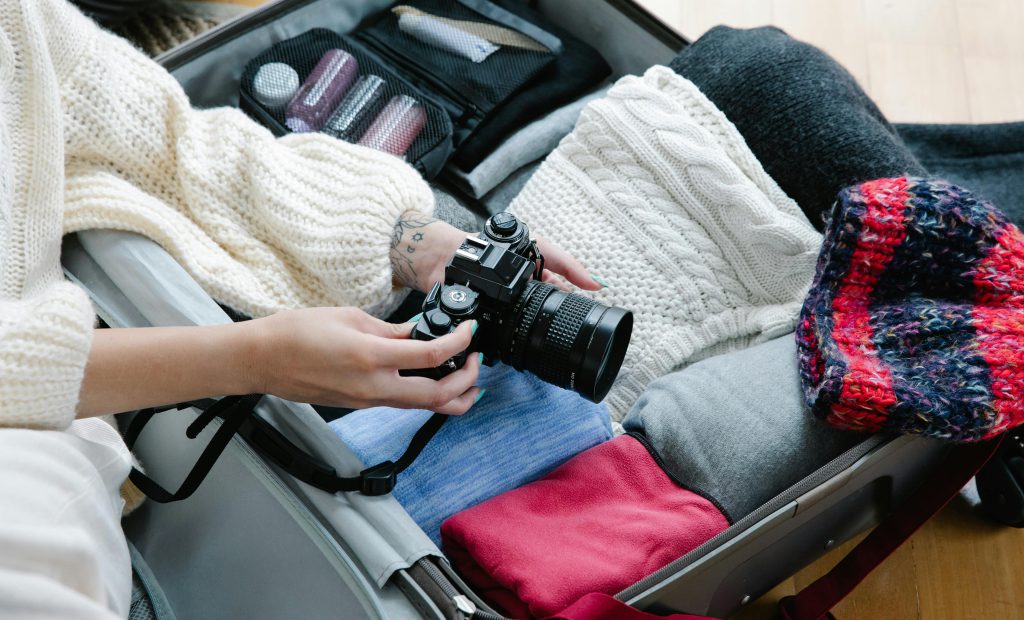 Packing warm sweaters and camera for a fall trip to Big Bear Lake