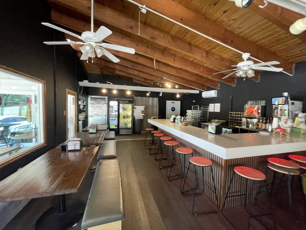 modern interior seating and bar area inside Piza Kama in Big Bear Lake