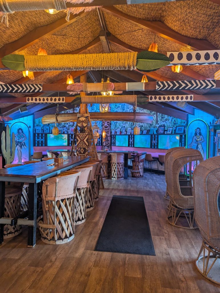 Main dining area inside Tropicali Big Bear with unique island-style decor