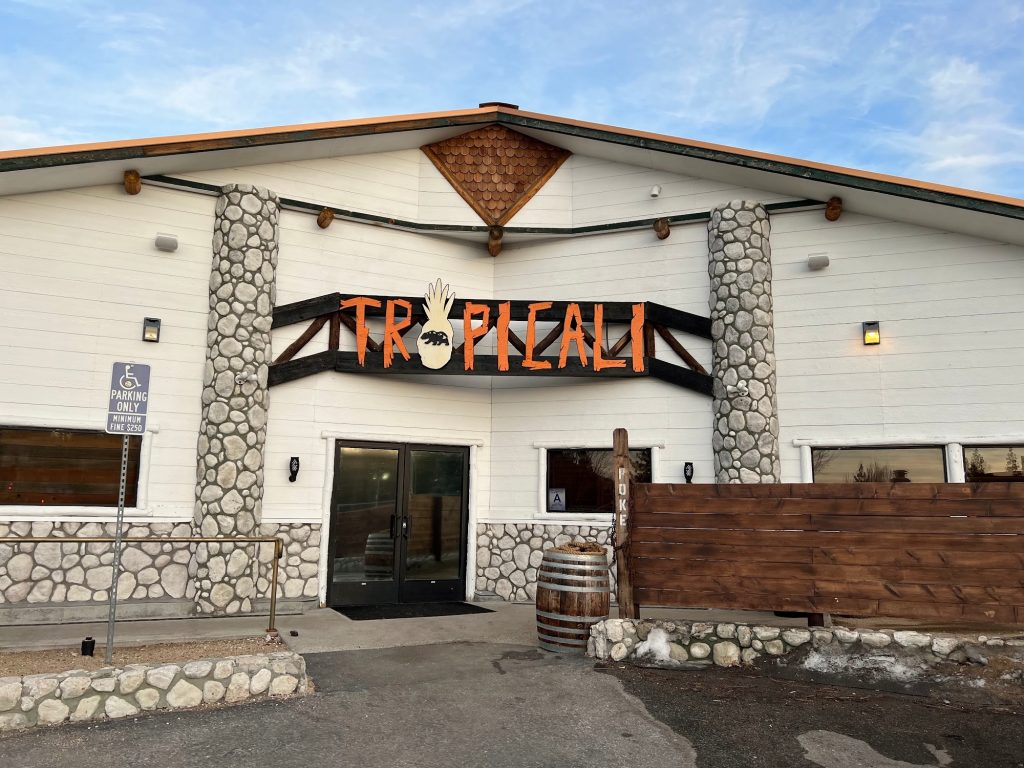 Exterior entrance of Tropicali restaurant in Big Bear Lake with signage