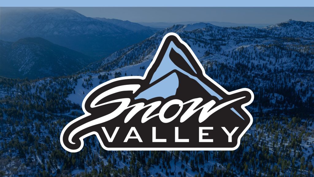Snow Valley ski resort mountain landscape with snowy terrain and Snow Valley logo